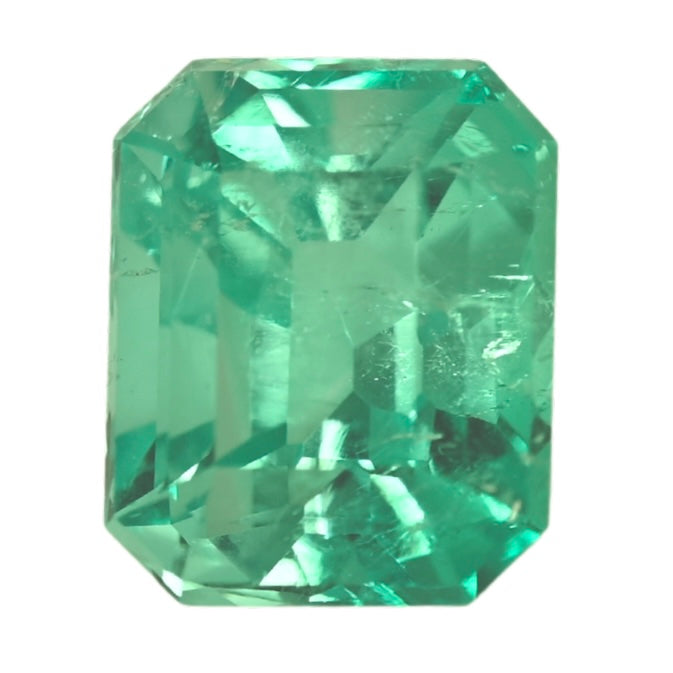 Octagonal green emerald gemstone, faceted, close-up