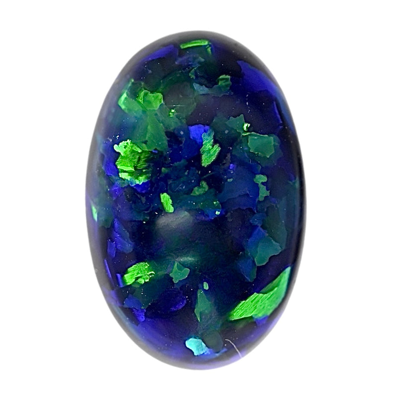 Oval black opal cabochon with vivid blue and green flashes