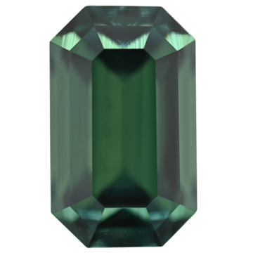 Teal emerald-cut sapphire with beveled octagon outline and step facets