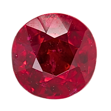 Close-up faceted round ruby gemstone in vivid red, showing crown and facets