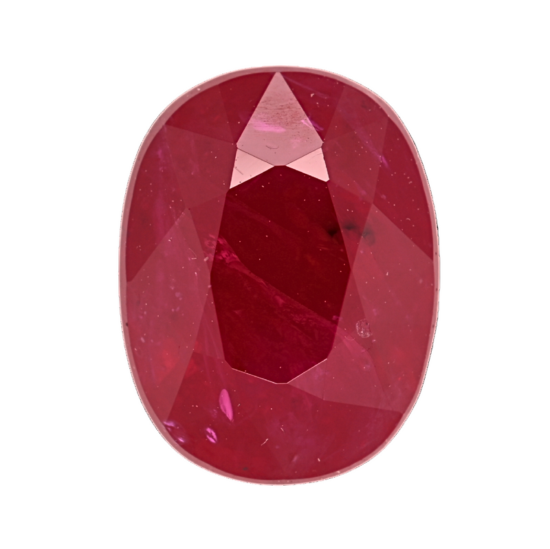 Oval ruby gemstone close-up, faceted top and pavilion facets visible