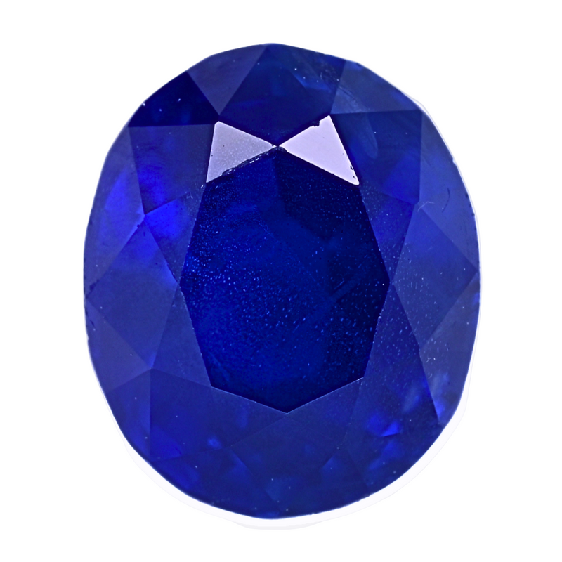 Close-up round blue sapphire gemstone, detailed faceted crown