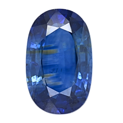 Oval blue sapphire gemstone close-up, facet reflections