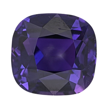 Oval purple sapphire gemstone with deep violet center and prominent facets