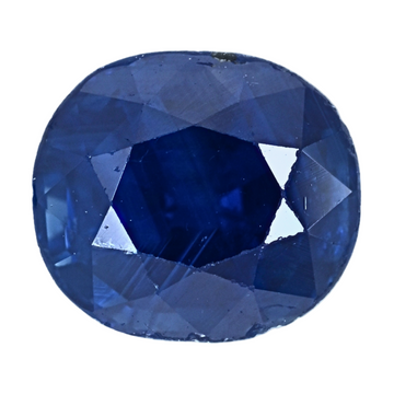 Close-up of oval blue sapphire with deep faceted center