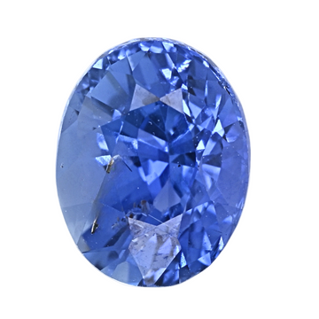 Close-up oval faceted blue sapphire gemstone, vivid blue facets