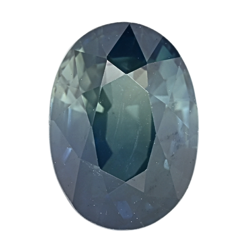 Teal oval faceted sapphire gemstone close-up