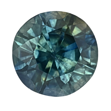 Oval teal sapphire gemstone, close-up of faceted sparkle