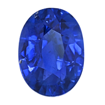 Oval blue sapphire gemstone with faceted cut and glossy reflective surface
