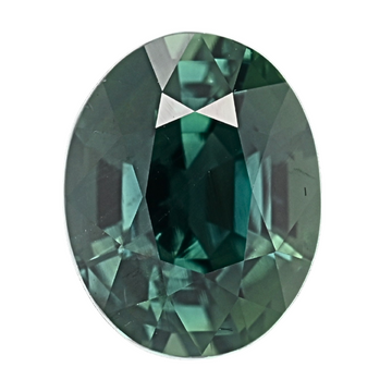 Teal bi-color oval sapphire gemstone close-up with bright facets