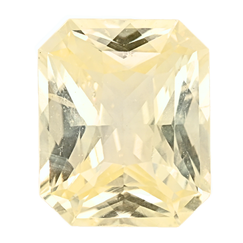 Emerald-cut yellow sapphire gemstone close-up, faceted