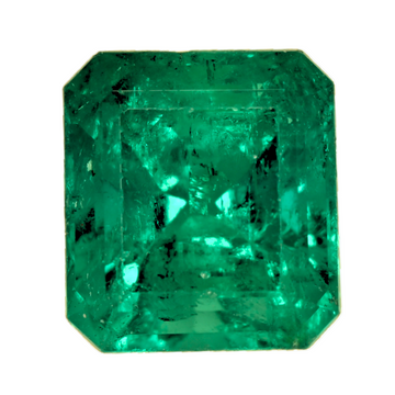 Large close-up of green emerald gemstone, emerald-cut with step facets