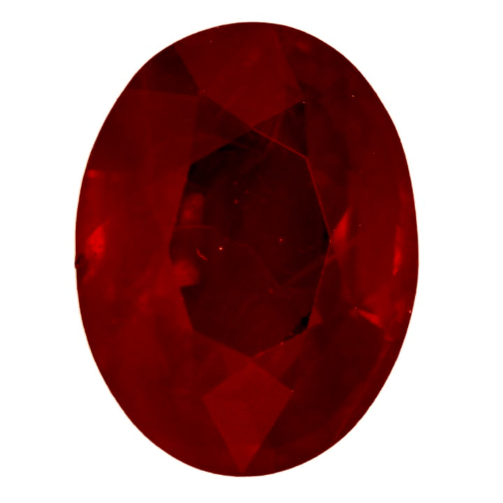 Oval deep red ruby gemstone close-up with faceted brilliance