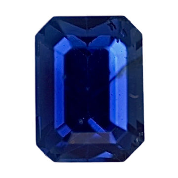 Blue sapphire gemstone, emerald-cut style with stepped facets, octagonal shape