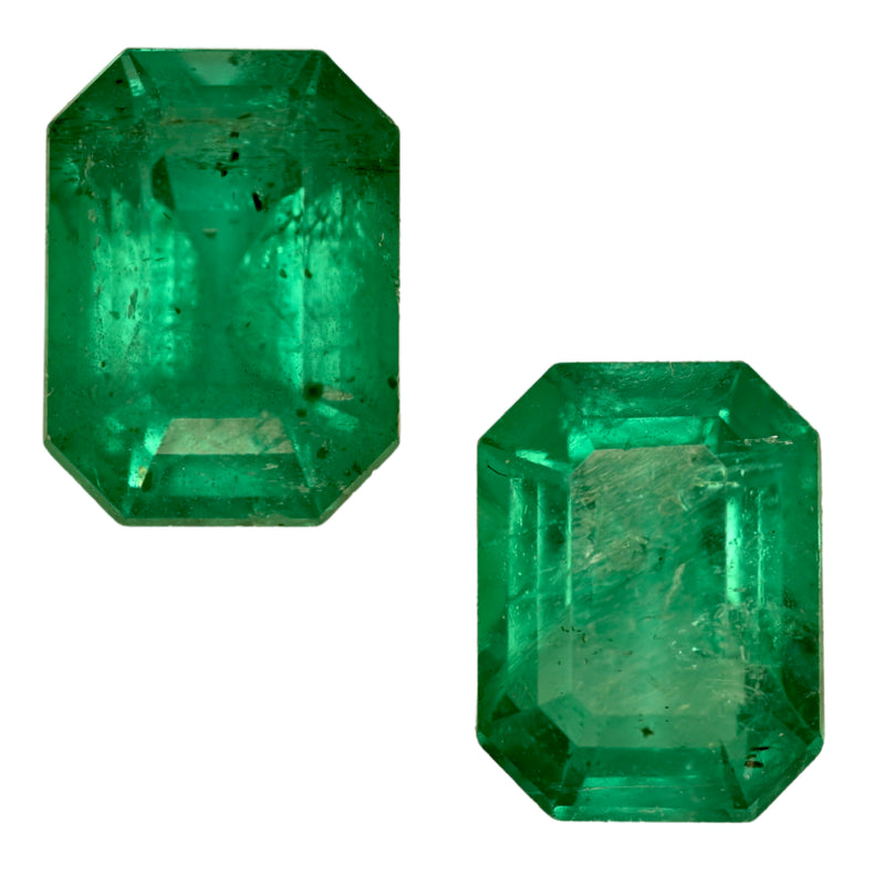 Emerald-cut green gemstone pair, octagonal step-cut facets