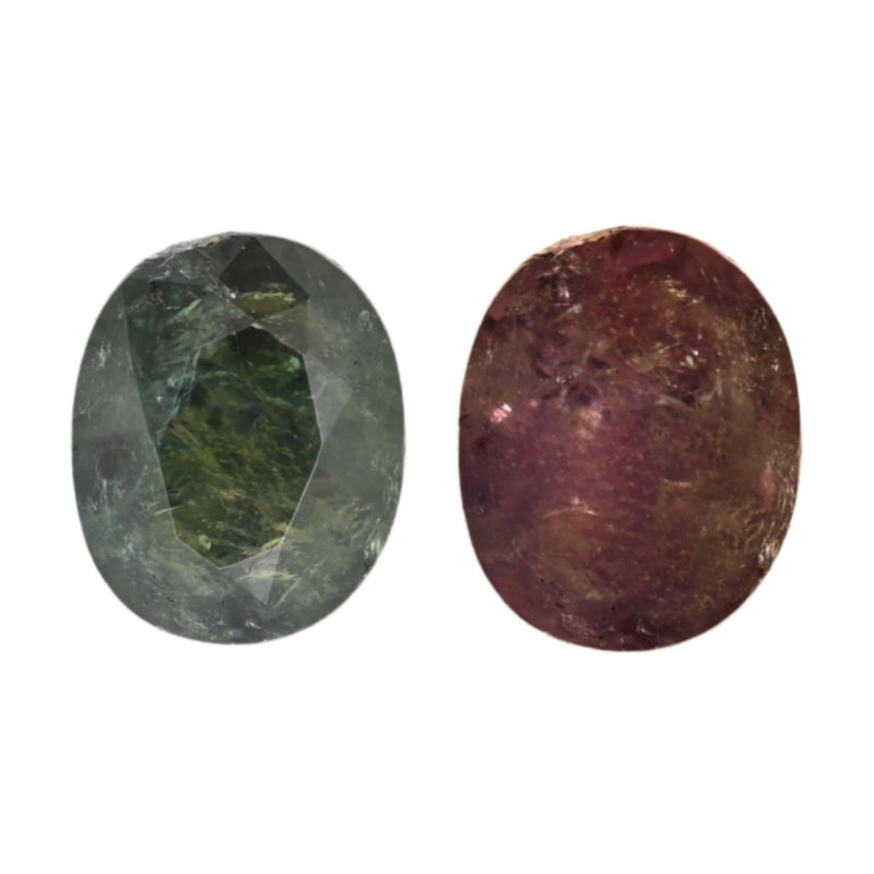Oval alexandrite gemstones in dark green and deep maroon, flat facet view