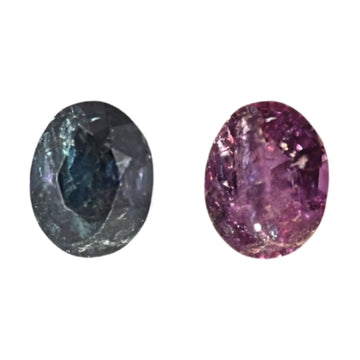 Oval alexandrite gemstones, dark teal and purple with faceted sparkle
