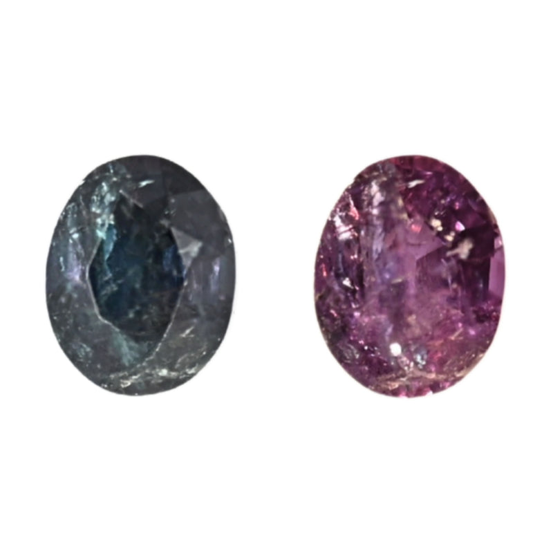Oval alexandrite gemstones, dark teal and purple with faceted sparkle