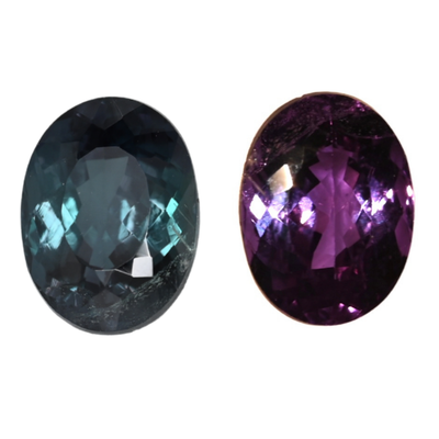 Oval alexandrite gemstone pair, dark teal and vivid purple, faceted sparkle