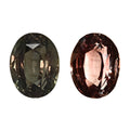 Oval alexandrite gemstone, dark green with reddish tones, faceted