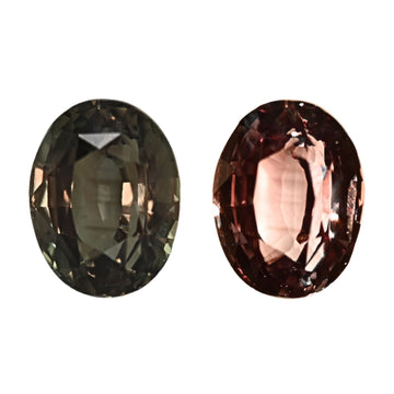 Oval alexandrite gemstone, dark green with reddish tones, faceted