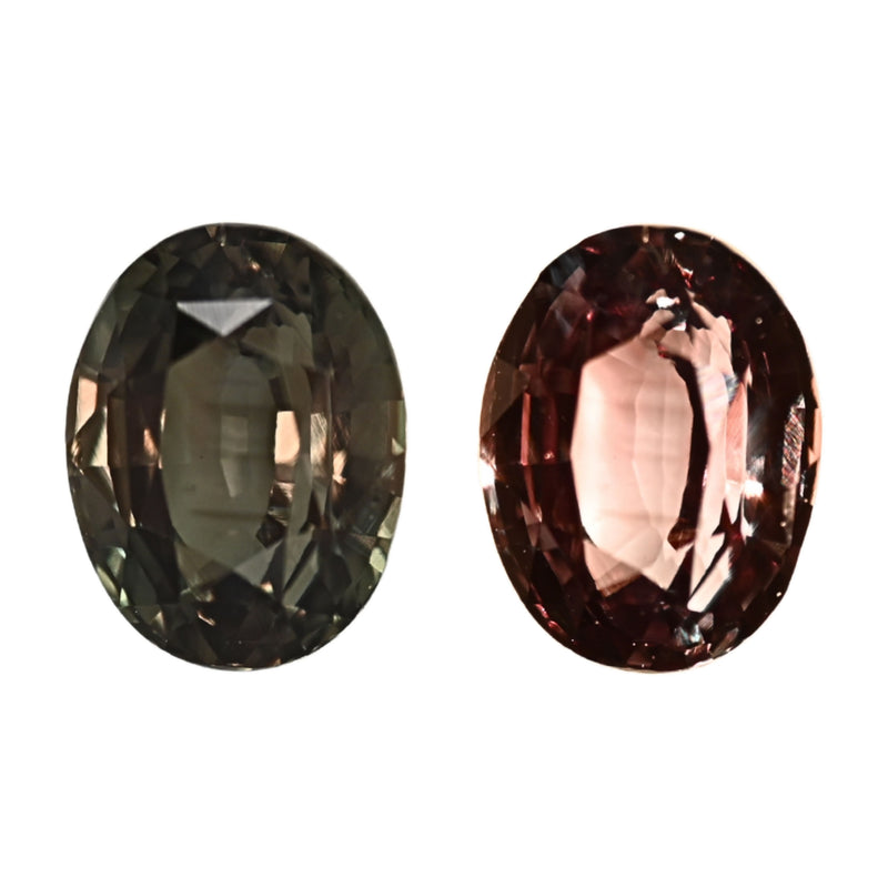 Oval alexandrite gemstone, dark green with reddish tones, faceted