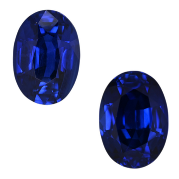 Pair of oval-cut blue sapphire gemstones, deep vivid blue facets