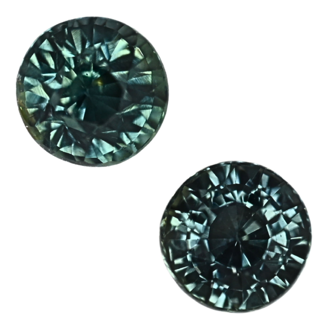 Pair of round teal sapphire gemstones, faceted