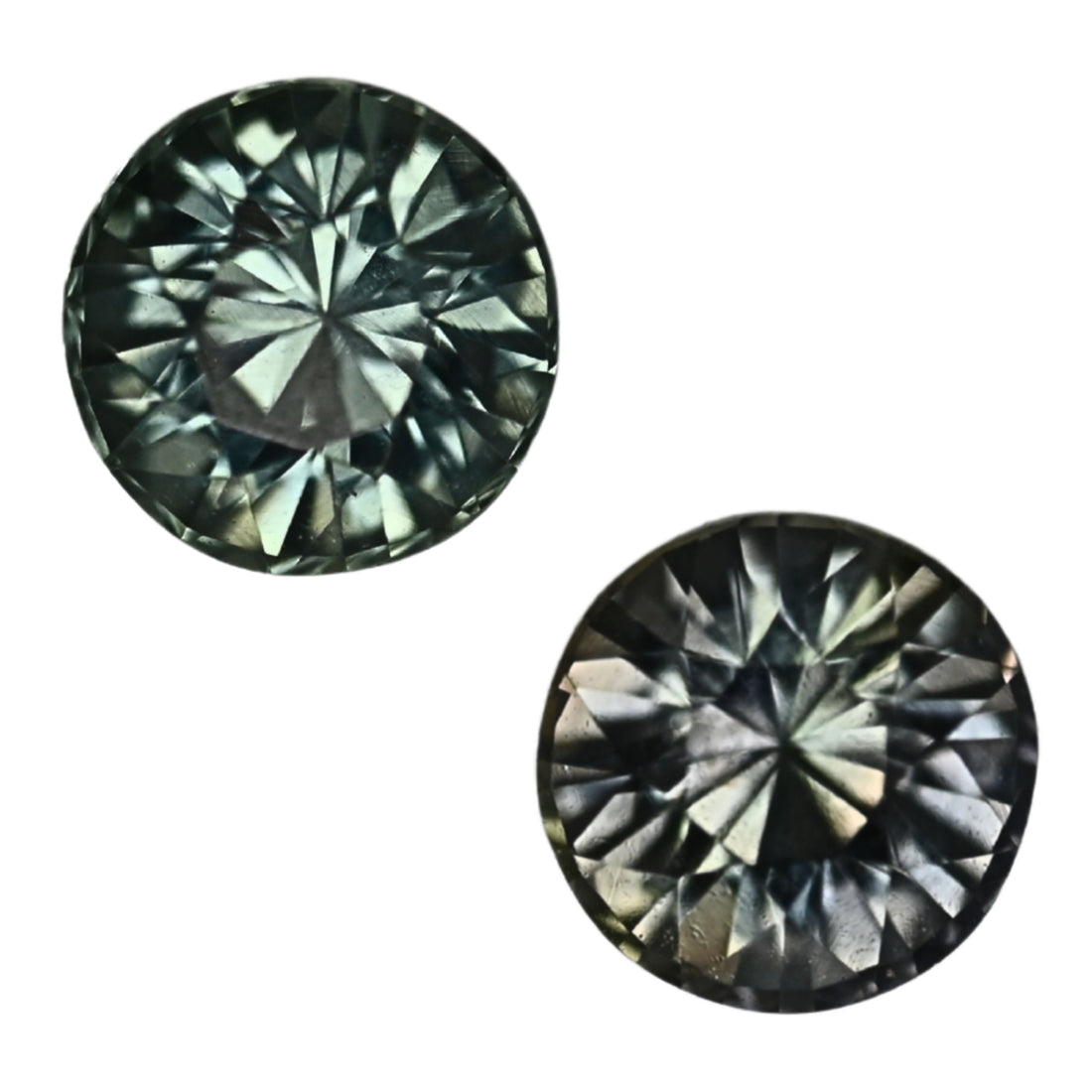 Pair of round teal sapphire gemstones, brilliant faceted stones
