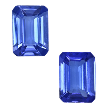 Blue tanzanite emerald-cut gemstone pair, rectangular step-cut facets