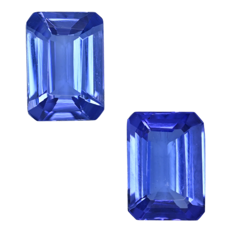 Blue tanzanite emerald-cut gemstone pair, rectangular step-cut facets