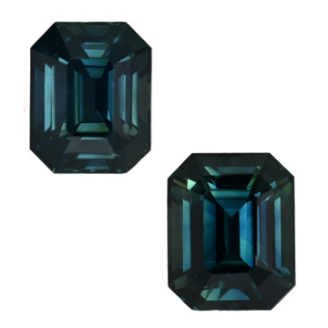 Teal sapphire gemstone pair in emerald-cut, deep teal faceted stones