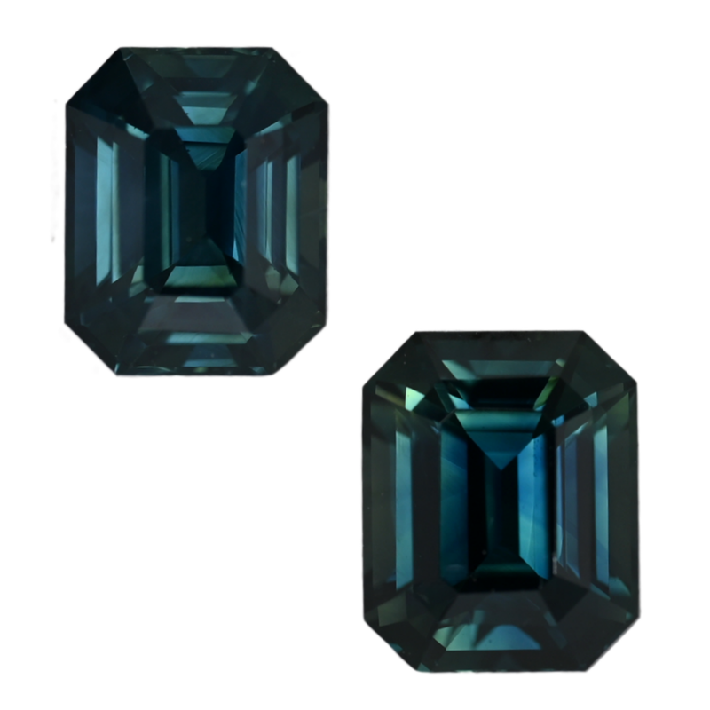 Teal sapphire gemstone pair in emerald-cut, deep teal faceted stones