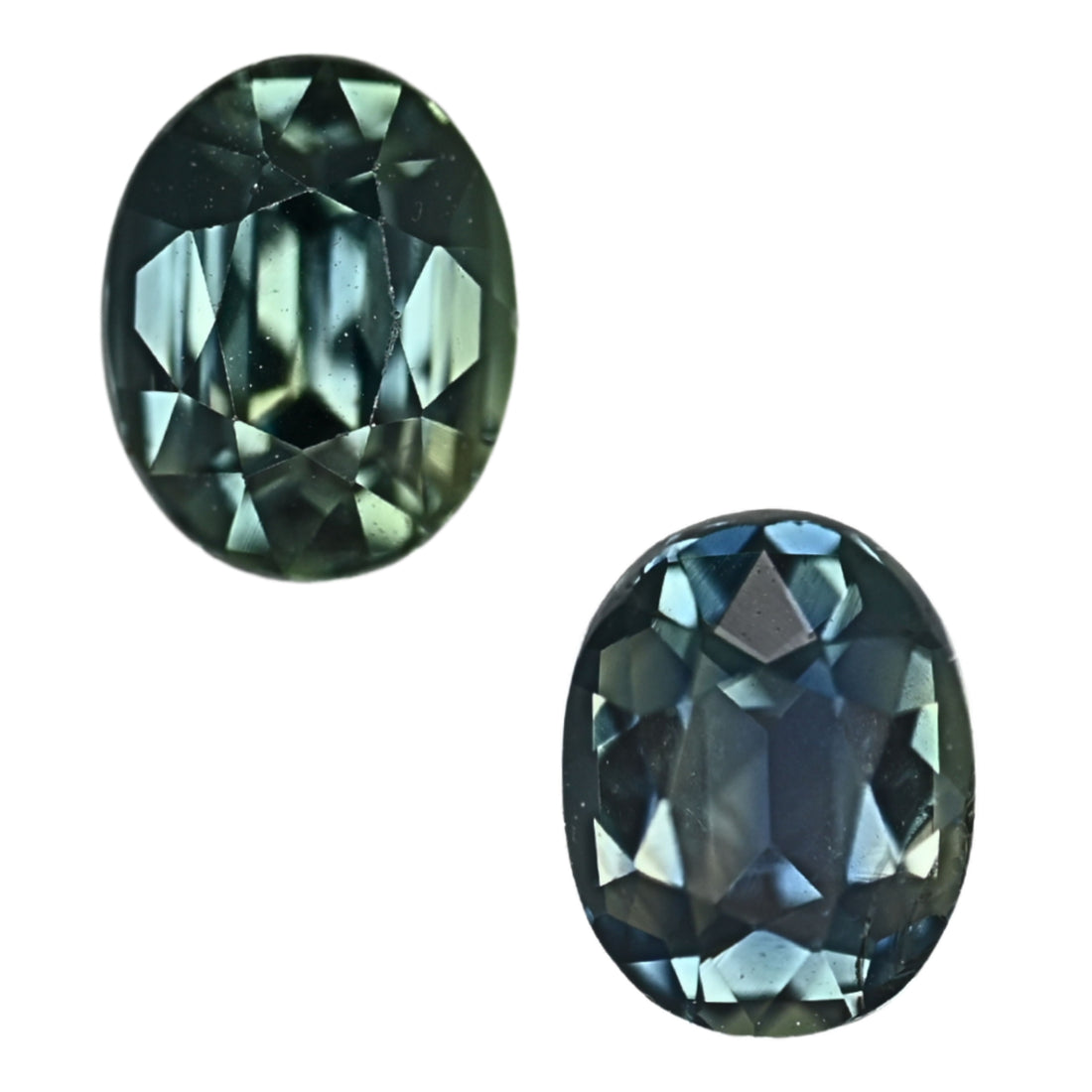 Oval faceted teal sapphire pair