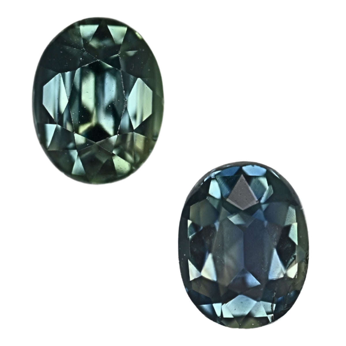 Oval faceted teal sapphire pair