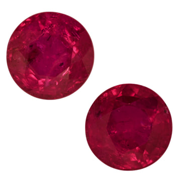 Pair of round faceted red ruby gemstones