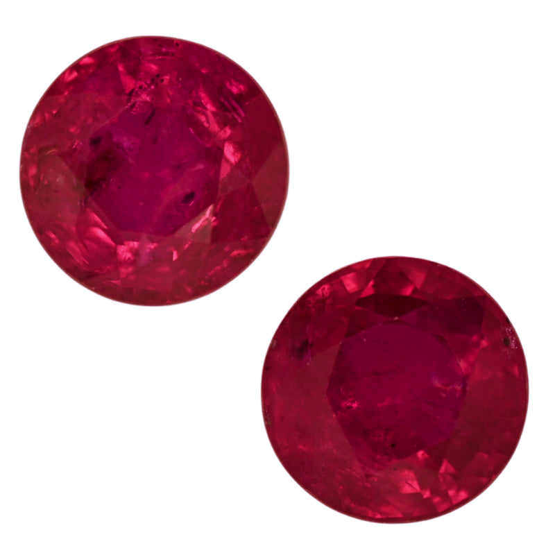 Pair of round faceted red ruby gemstones