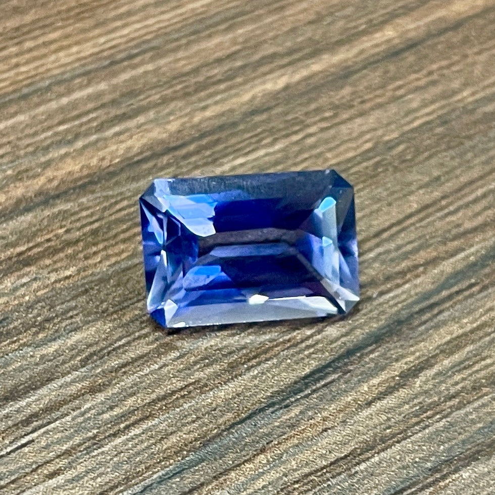 Rectangular-cut blue iolite gemstone
