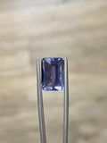 Iolite rectangular-cut gemstone in silver-tone prong setting