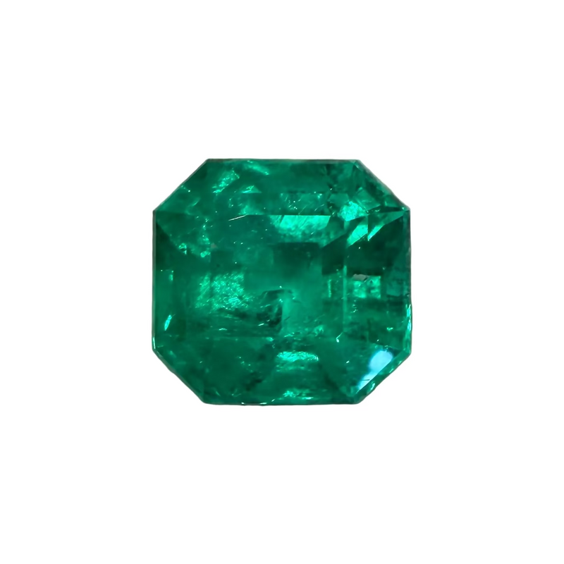 Octagonal emerald-cut gemstone, vivid green with faceted sparkle