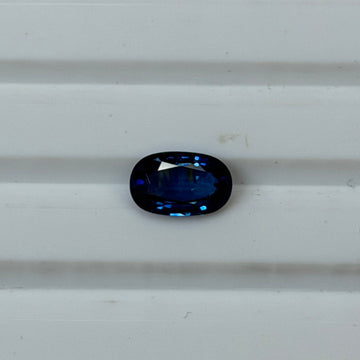 1.41-carat oval blue sapphire gemstone, polished oval cut