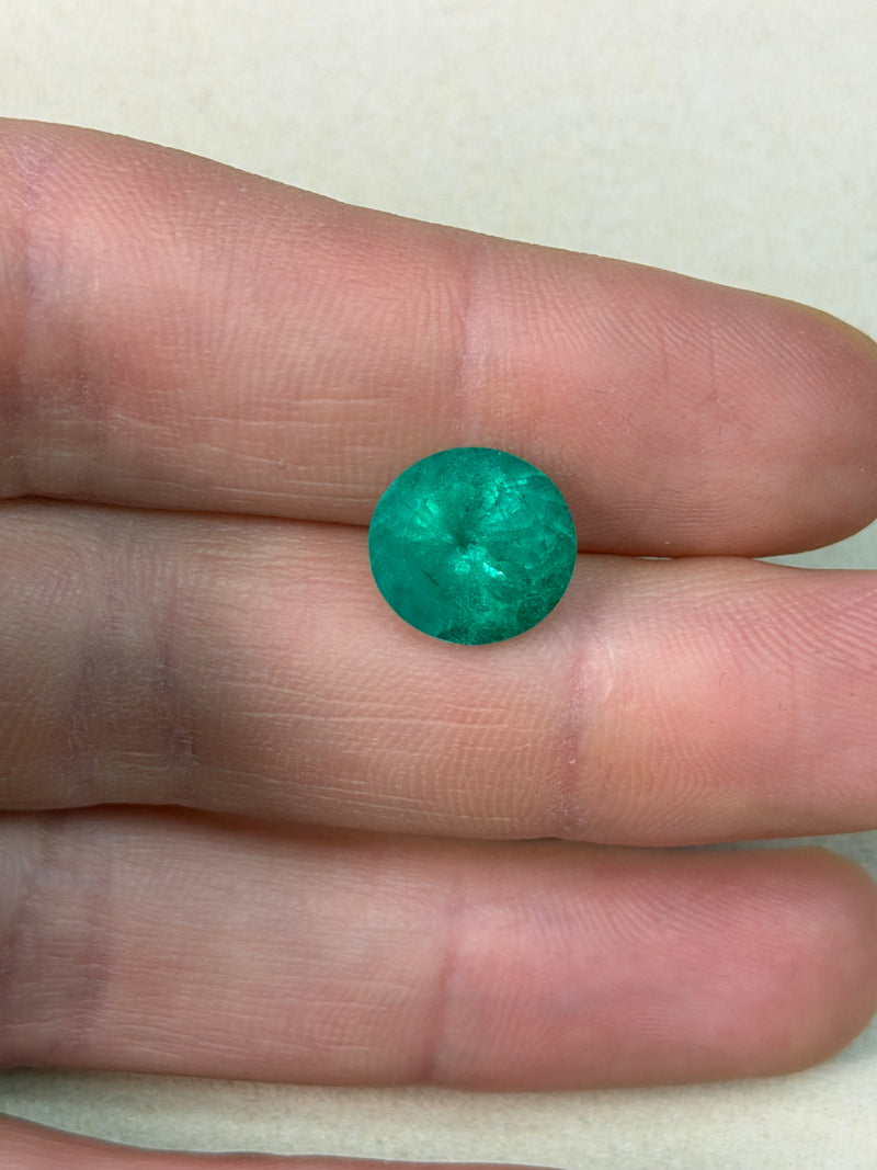 Round green emerald cabochon gemstone