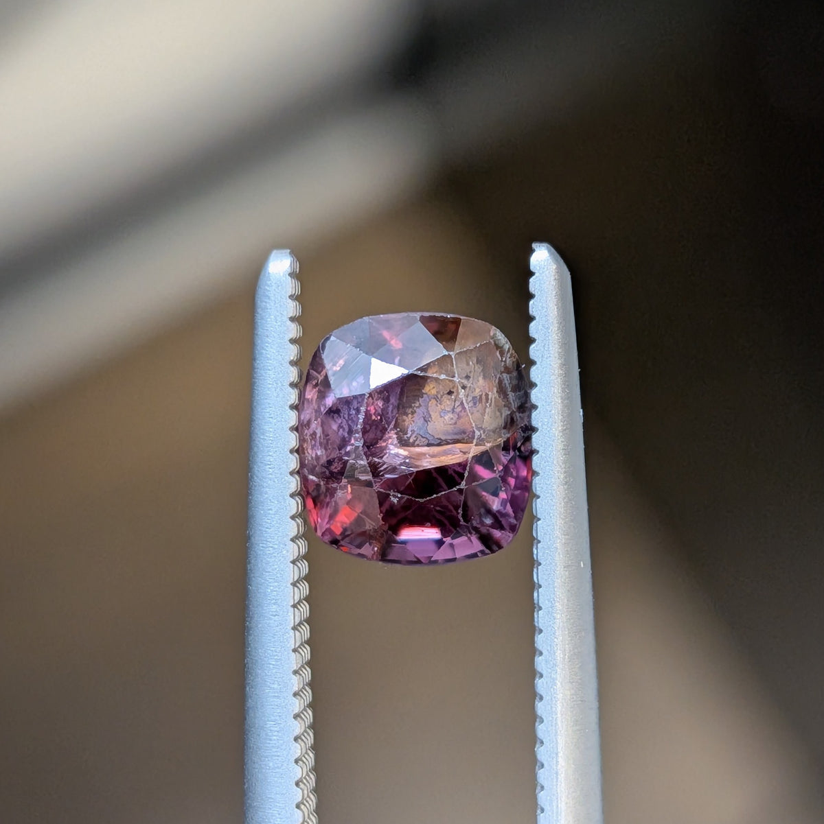 1.10ct bicolor spinel, cushion-cut gemstone in prong setting