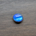 Oval blue opal cabochon, polished dome gemstone