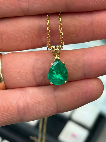 Gold-tone emerald teardrop pendant necklace with short chain and small loop bail