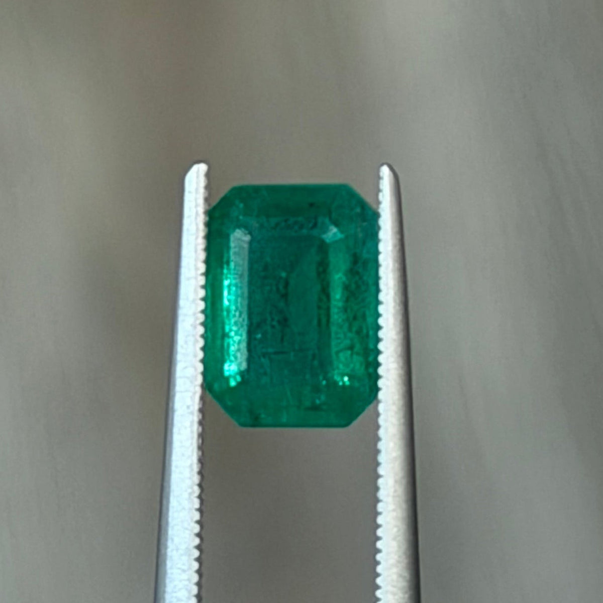 1.43ct Zambian emerald, emerald-cut green gemstone in silver setting
