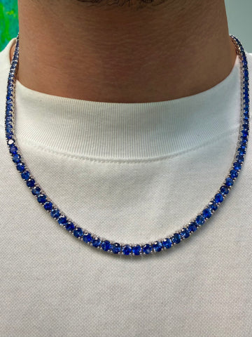 Blue sapphire tennis necklace with round stones in a continuous line