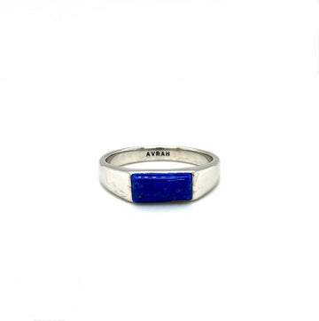 Sterling silver signet ring with embedded rectangular lapis stone, flat profile