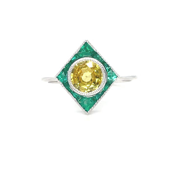 Square yellow sapphire center with emerald border and diamond halo ring, white gold