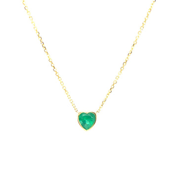 Heart-shaped emerald pendant in 14k yellow gold on chain
